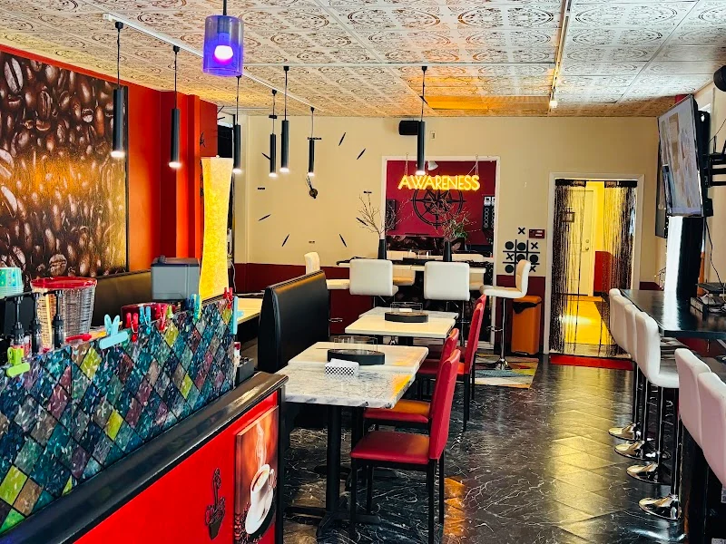 Bright Rosie's interior with cafe counter, tables, games, and colorful seating