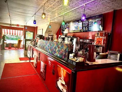 Rosie's order counter with red interior and cafe equipment